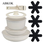 Set di pentole e padelle antiaderenti da 8 pezzi con coperchi, manico staccabile, supporti per pentole, cassaforte per il forno, compatibile con tutti i piani cottura