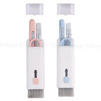 Kit di pulizia 7-in-1 per tastiera del computer, penna per la pulizia degli auricolari, strumenti per la pulizia di telefono e iPad, estrattore per copritasti