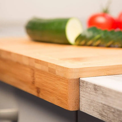 Allergen-free eco-friendly bamboo cutting board for kitchen and bar with practical edge