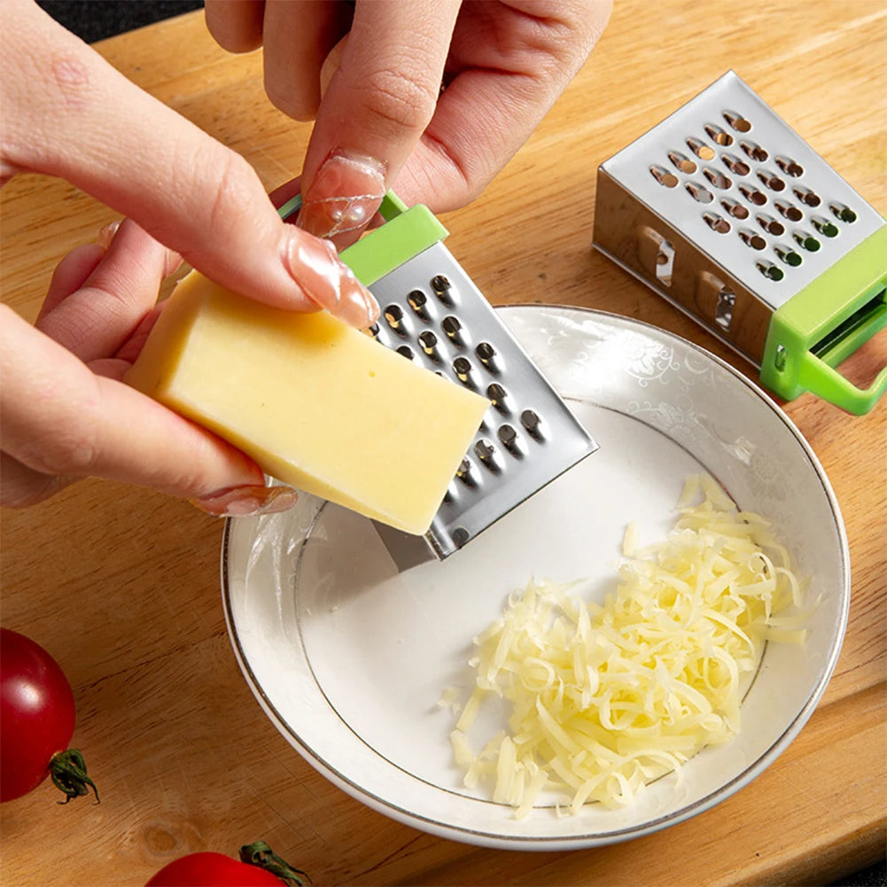Frucht-, Ingwer- und Knoblauchreibe mit rutschfestem Griff, Knoblauchpresse, multifunktionaler Edelstahl-Gemüseschäler, Küchenzubehör